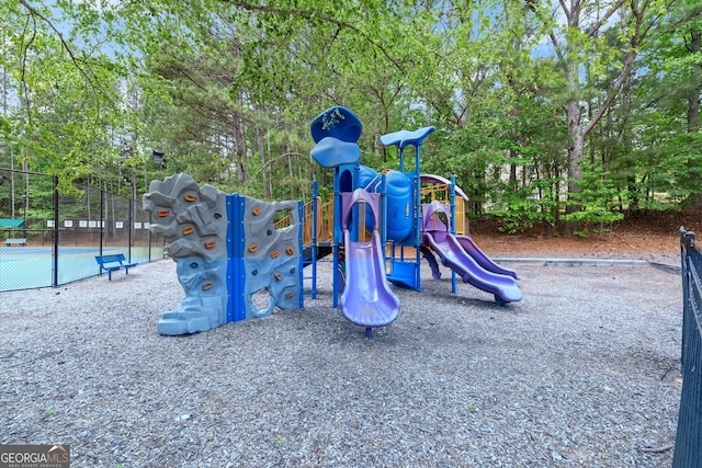 community jungle gym with fence