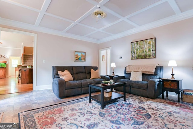 living area featuring baseboards, coffered ceiling, and beam ceiling