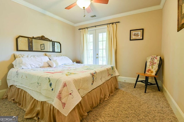 bedroom featuring a ceiling fan, visible vents, baseboards, ornamental molding, and light carpet