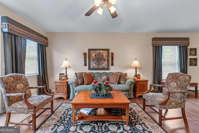 661 Village Field Ct NW, Suwanee, GA 30024 - living area featuring a ceiling fan and light wood-type flooring