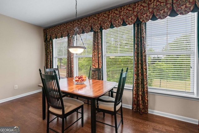 661 Village Field Ct NW, Suwanee, GA 30024 - dining area featuring baseboards and wood finished floors