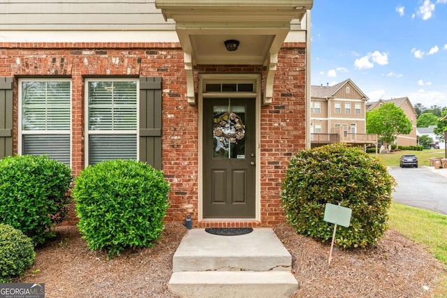 661 Village Field Ct NW, Suwanee, GA 30024 - property entrance with brick siding