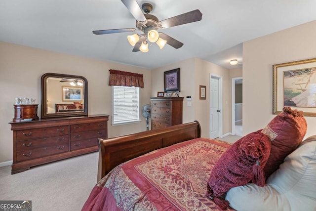 661 Village Field Ct NW, Suwanee, GA 30024 - carpeted bedroom with baseboards and a ceiling fan