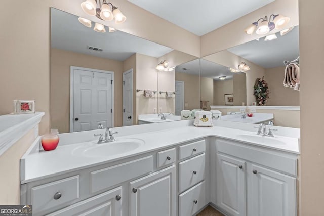661 Village Field Ct NW, Suwanee, GA 30024 - full bath featuring double vanity, visible vents, and a sink