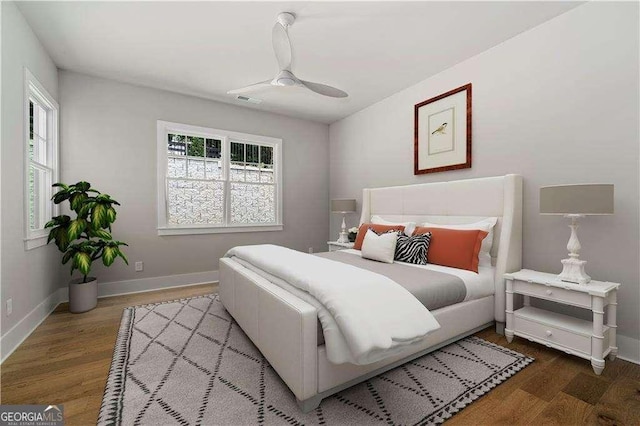 7235 Cordery Rd, Cumming, GA 30040 - bedroom featuring baseboards, ceiling fan, wood finished floors, and visible vents