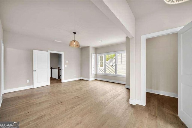 7235 Cordery Rd, Cumming, GA 30040 - interior space featuring baseboards and light wood finished floors