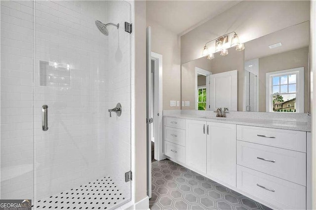 7235 Cordery Rd, Cumming, GA 30040 - bathroom featuring vanity, tile patterned flooring, a stall shower, and visible vents