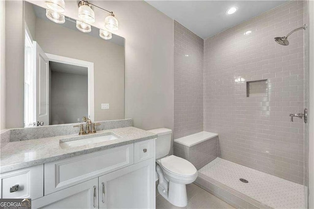 7235 Cordery Rd, Cumming, GA 30040 - bathroom with vanity, tile patterned flooring, toilet, and tiled shower