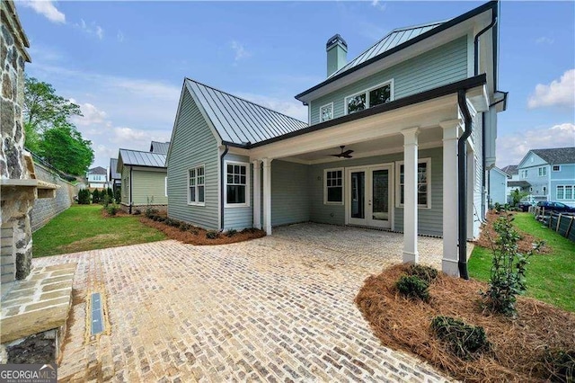 7235 Cordery Rd, Cumming, GA 30040 - rear view of house with french doors, a ceiling fan, a standing seam roof, and metal roof