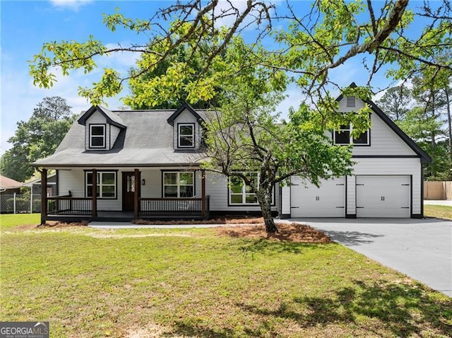 2979 Overwood Ln SW, Snellville, GA 30078 - view of front of house with concrete driveway, a garage, and a porch