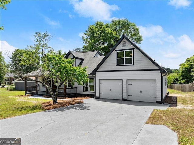 2979 Overwood Ln SW, Snellville, GA 30078 - view of front of property featuring driveway and an attached garage
