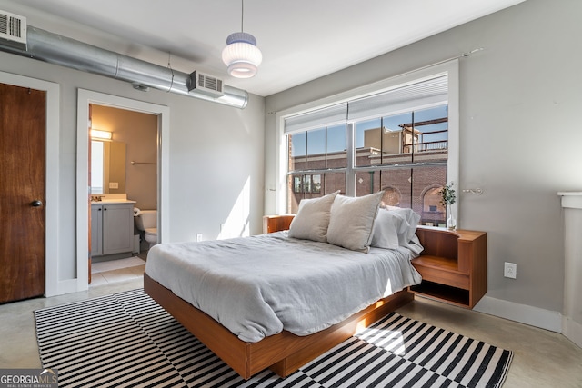 791 Wylie St SE Unit 912, Atlanta, GA 30316 - bedroom with concrete flooring, baseboards, and visible vents