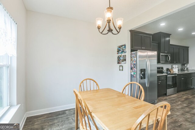 113 Hamlet Ct, Hinesville, GA 31313 - dining area with recessed lighting, baseboards, a chandelier, and dark wood-type flooring