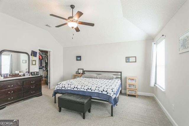 113 Hamlet Ct, Hinesville, GA 31313 - bedroom with a spacious closet, visible vents, multiple windows, and lofted ceiling