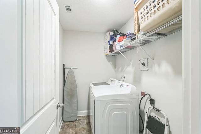 113 Hamlet Ct, Hinesville, GA 31313 - laundry area featuring baseboards, visible vents, laundry area, and washer and clothes dryer