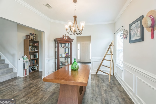 113 Hamlet Ct, Hinesville, GA 31313 - dining area with dark wood-style flooring, a chandelier, crown molding, stairway, and a wainscoted wall
