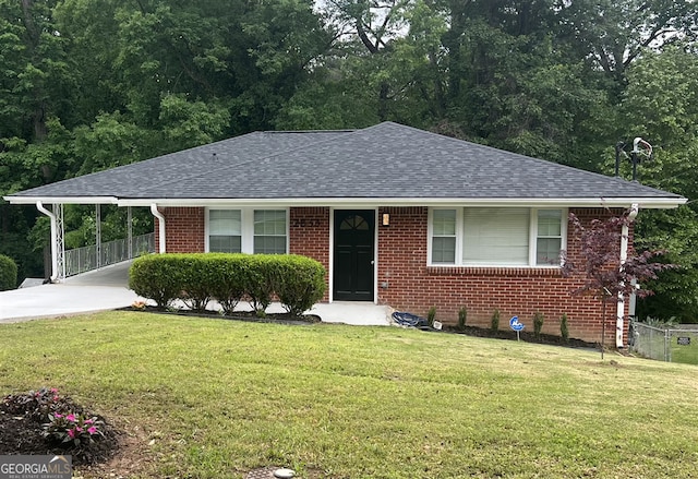 2833 Oldknow Dr NW, Atlanta, GA 30318 - ranch-style home with roof with shingles, fence, a front yard, and brick siding