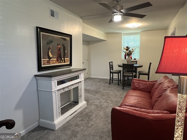 2833 Oldknow Dr NW, Atlanta, GA 30318 - living room with carpet floors, a ceiling fan, baseboards, and visible vents