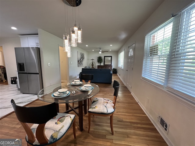 2833 Oldknow Dr NW, Atlanta, GA 30318 - dining room featuring a ceiling fan, visible vents, wood finished floors, and recessed lighting
