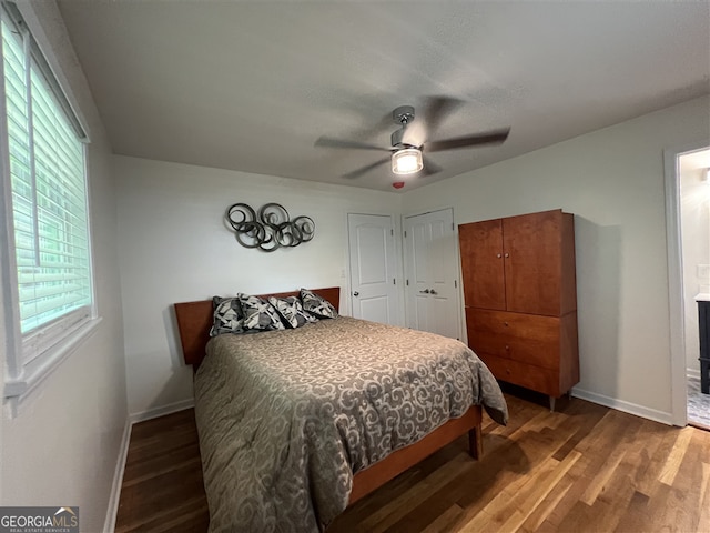 2833 Oldknow Dr NW, Atlanta, GA 30318 - bedroom featuring a ceiling fan, baseboards, and wood finished floors