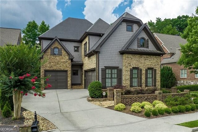 5206 Creek Walk Cir, Peachtree Corners, GA 30092 - craftsman-style house with brick siding, an attached garage, and driveway