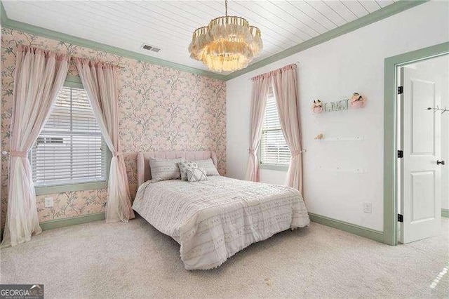 bedroom featuring light carpet, a chandelier, wallpapered walls, visible vents, and ornamental molding