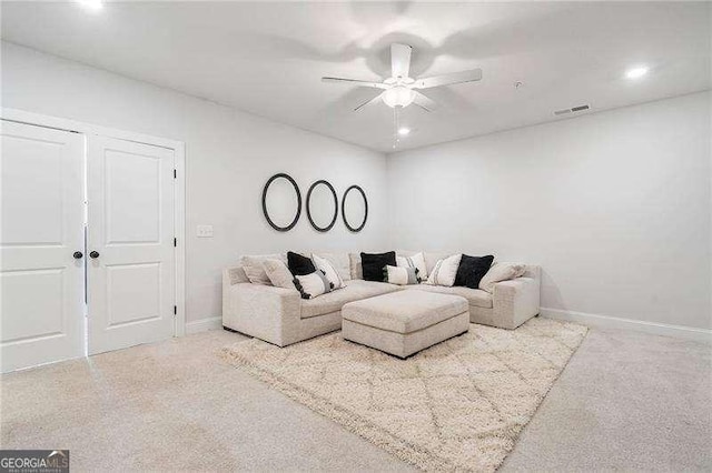 carpeted living area featuring visible vents, recessed lighting, baseboards, and ceiling fan