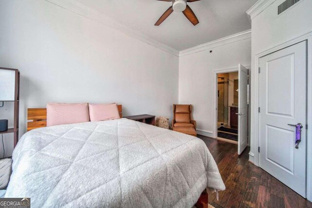bedroom with ceiling fan, baseboards, dark wood-type flooring, visible vents, and ornamental molding