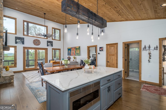 454 N Old Aska Rd, Blue Ridge, GA 30513 - kitchen featuring wood ceiling, stainless steel microwave, gray cabinetry, a towering ceiling, and dark wood-style floors