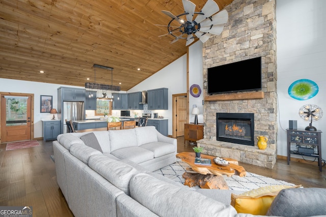 454 N Old Aska Rd, Blue Ridge, GA 30513 - living area with ceiling fan, wooden ceiling, a fireplace, dark wood finished floors, and high vaulted ceiling