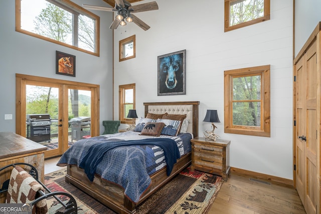 454 N Old Aska Rd, Blue Ridge, GA 30513 - bedroom with a towering ceiling, access to outside, wood-type flooring, french doors, and baseboards