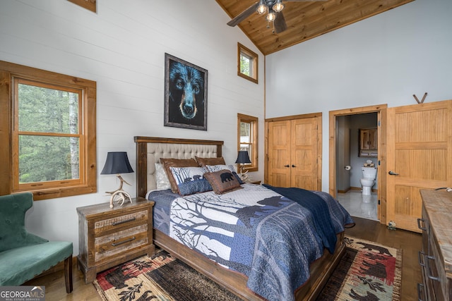 454 N Old Aska Rd, Blue Ridge, GA 30513 - bedroom with high vaulted ceiling, wood finished floors, wood ceiling, connected bathroom, and beamed ceiling