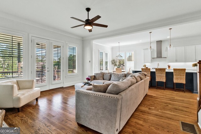 2201 Old Dallas Rd SW, Marietta, GA 30064 - living room with crown molding, a ceiling fan, visible vents, and dark wood finished floors