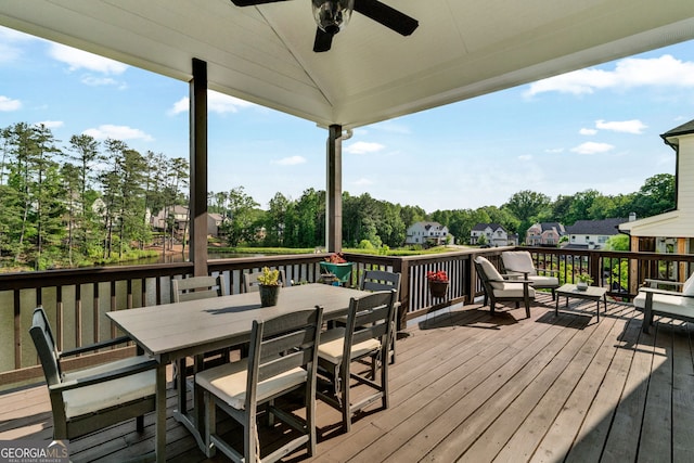 2201 Old Dallas Rd SW, Marietta, GA 30064 - wooden terrace with outdoor dining area, a ceiling fan, and a residential view