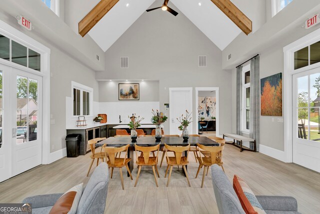 2201 Old Dallas Rd SW, Marietta, GA 30064 - dining room featuring light wood finished floors, high vaulted ceiling, visible vents, and beam ceiling