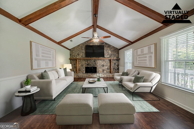 228 Amour Way SW, Lilburn, GA 30047 - living area featuring wood finished floors, healthy amount of natural light, ceiling fan, a wainscoted wall, and a decorative wall