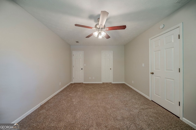 228 Amour Way SW, Lilburn, GA 30047 - unfurnished bedroom with carpet floors and ceiling fan