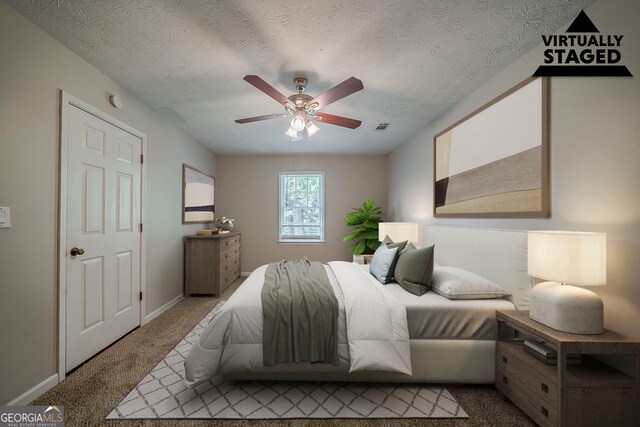 228 Amour Way SW, Lilburn, GA 30047 - bedroom featuring carpet flooring, a ceiling fan, and a textured ceiling