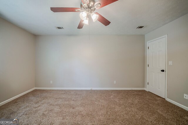 228 Amour Way SW, Lilburn, GA 30047 - carpeted spare room featuring a ceiling fan and baseboards