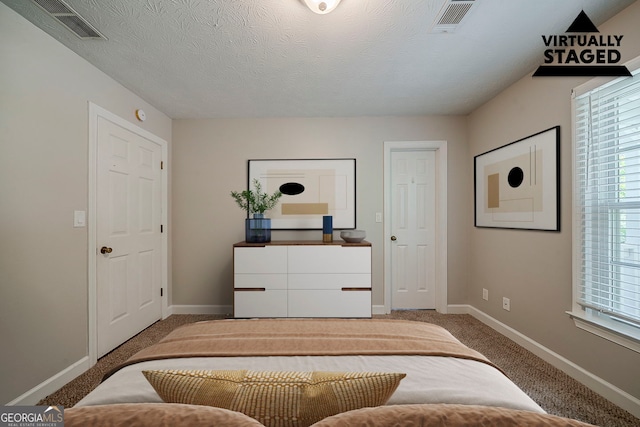 228 Amour Way SW, Lilburn, GA 30047 - bedroom with carpet and a textured ceiling