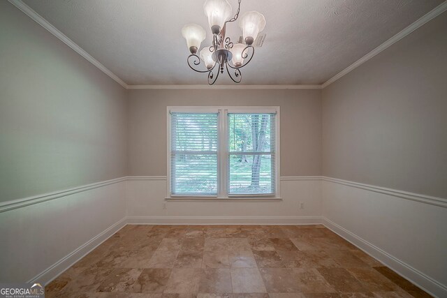228 Amour Way SW, Lilburn, GA 30047 - unfurnished dining area featuring baseboards, stone finish flooring, ornamental molding, and a notable chandelier