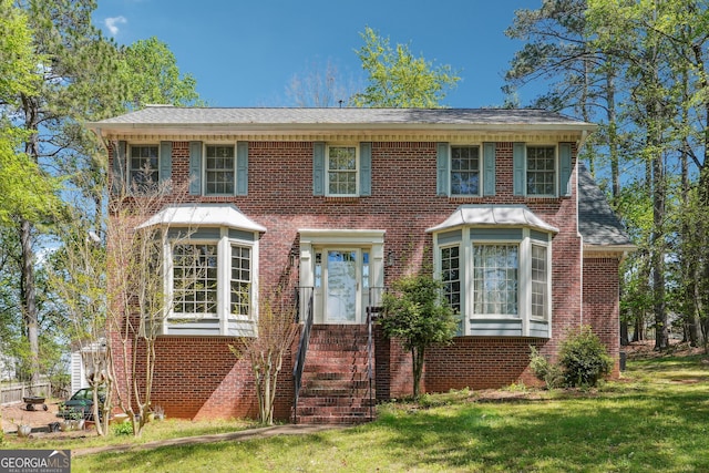 1366 Maple Ridge Dr, Suwanee, GA 30024 - view of front of property featuring brick siding and a front yard
