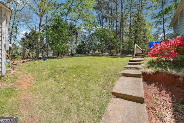 1366 Maple Ridge Dr, Suwanee, GA 30024 - view of yard featuring a wooden deck