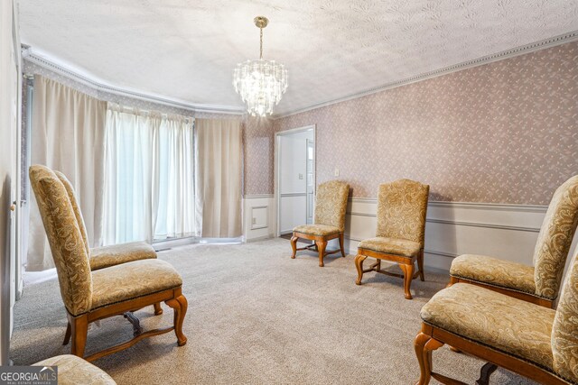 1366 Maple Ridge Dr, Suwanee, GA 30024 - living area with crown molding, an inviting chandelier, wallpapered walls, a wainscoted wall, and carpet