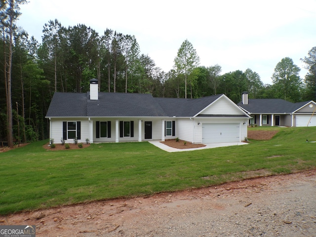 280 Grady Brock Rd Lot 21, Martin, GA 30557 - ranch-style home with an attached garage, a chimney, driveway, and a front lawn
