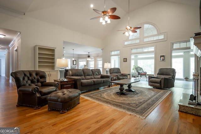 229 Deer Haven Run, Carlton, GA 30627 - living room featuring high vaulted ceiling, a ceiling fan, and wood finished floors