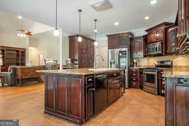 229 Deer Haven Run, Carlton, GA 30627 - kitchen with crown molding, appliances with stainless steel finishes, light tile patterned floors, and a sink