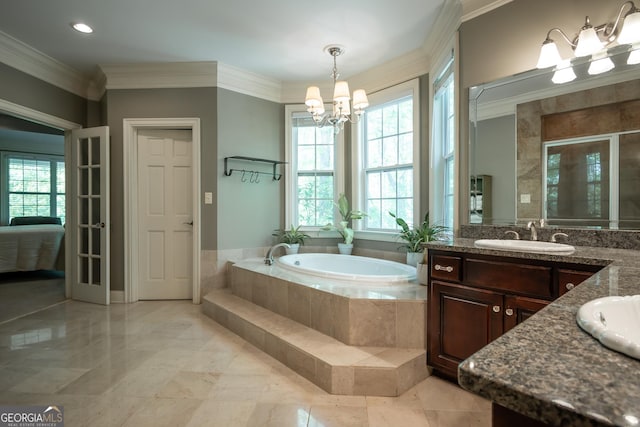 229 Deer Haven Run, Carlton, GA 30627 - full bathroom featuring a garden tub, a shower stall, a sink, a notable chandelier, and ornamental molding