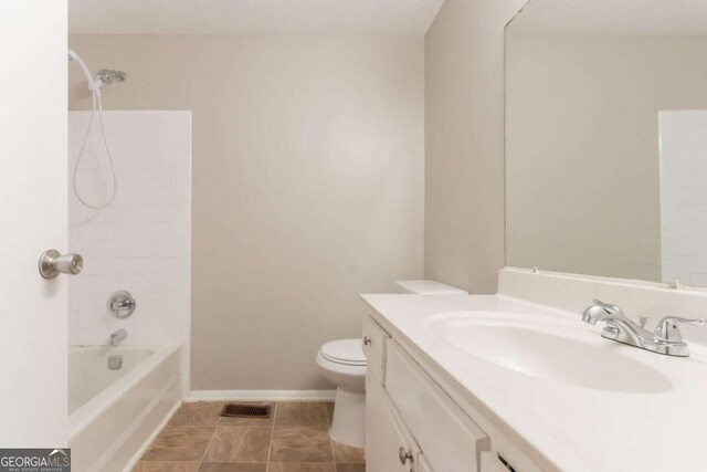 bathroom with tile patterned flooring, vanity, toilet, shower / washtub combination, and visible vents