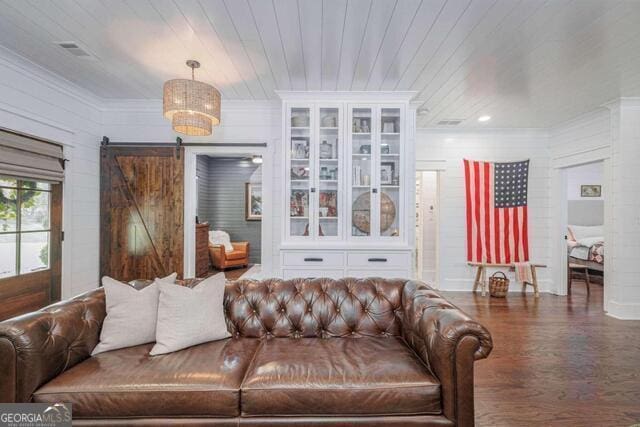 211 Hogan Coweta Rd, Hogansville, GA 30230 - living area featuring wood ceiling, visible vents, a barn door, wood finished floors, and ornamental molding